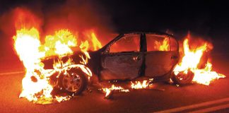 Abandoned car found burning on Highway 9