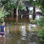 Round Lake Flood – Woman in Water