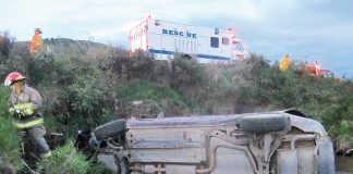 Car ends up in creek in bottom of valley