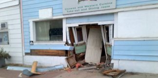 Vehicle slams into Chinese Cafe