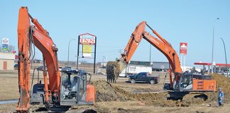 Water and sewer services being installed to new Co-op