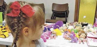 Residents pack 100 shoeboxes for children