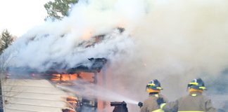 Family farm threatened by grass fire