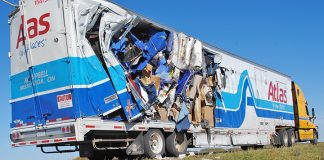 Moving van side-swipes parked semi on Hwy. 1