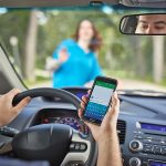 Drivers to be fined for ‘holding’ cell phone if driving