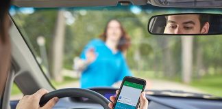 Drivers to be fined for ‘holding’ cell phone if driving