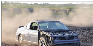Car rally and mud bug includes two rollovers