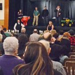 Charity auction raises $34,000 for new bus