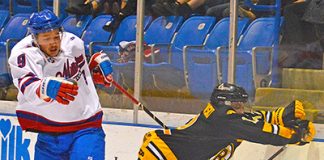 Mils double Bruins in final game before break