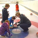 Curlers pass on love of sport to school kids