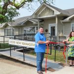 Helping Hands cuts ribbon to care house in Broadview