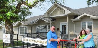 Helping Hands cuts ribbon to care house in Broadview