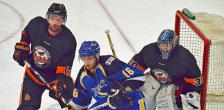 Spitfires shoot down Orioles in QVHL opener