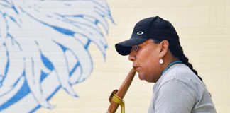 Flutist brings music, message to local students