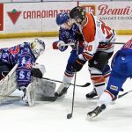 Entz backstops Mils to win after blowout