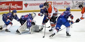 Entz backstops Mils to win after blowout