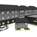 Construction begins on new hotel/apartments