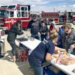 Firefighters serve up food and fun at Fuel Day fundraiser