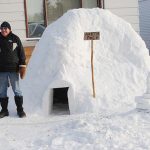 Senior builds and sleeps in igloo