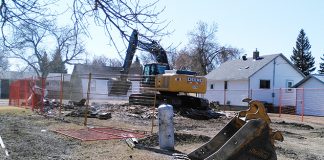 Dilapidated buildings come down in Melville