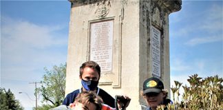 Volunteers plant flowers