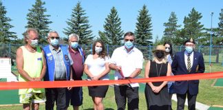 Ribbon cut on mini putt