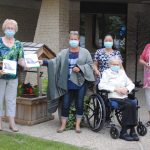 Harmony Club donates iPads to library and nursing home