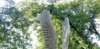Eagle carving sits in front of St. John’s Anglican