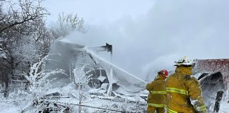 Fire destroys farm building south of town