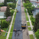 Road paving on schedule despite rainfall delays