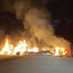 Two arrested after stolen semi catches fire
