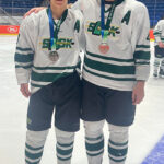 Bear and Hamilton bring back silver medals in hockey
