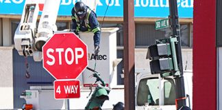 City replaces downtown street lights with stop signs