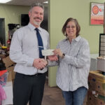 Melville community foundation makes $300 donation to food bank