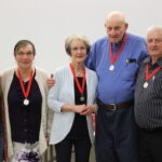 Five individuals receive Volunteer Service Medals