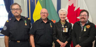 Lt. Gov. presents three Lemberg firefighters with service medals