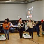 Cornhole tournament supports curling club
