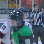 Wyonzek officiates Olympic hockey