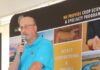 Grain Millers cuts cake at 25th anniversary celebration