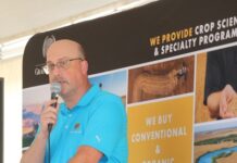 Grain Millers cuts cake at 25th anniversary celebration