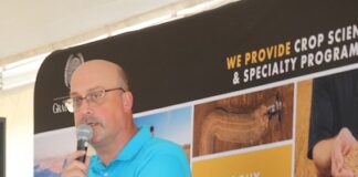 Grain Millers cuts cake at 25th anniversary celebration